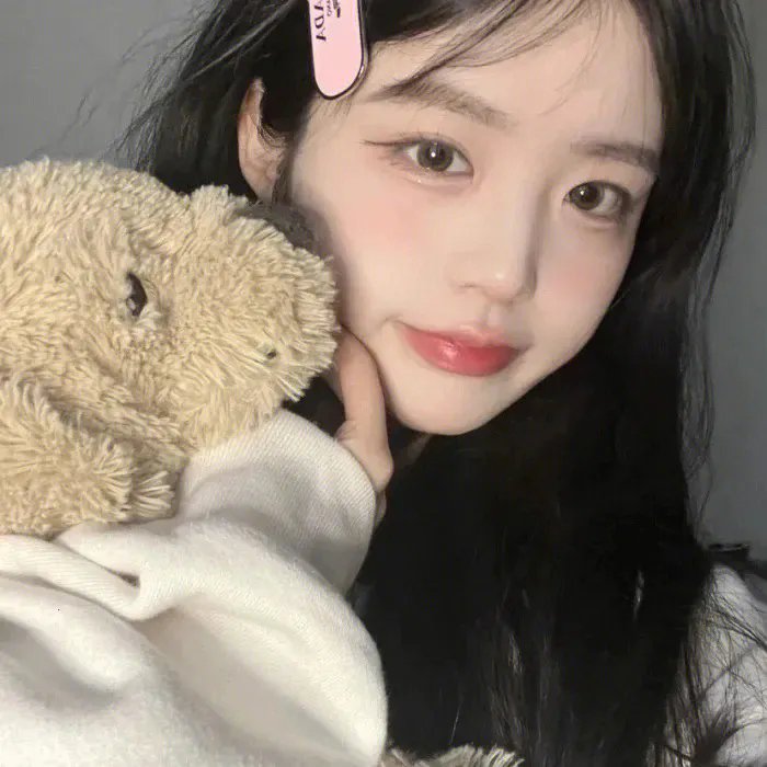 今朝春色倍还人